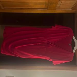 Fancy red dress. Size is 3x but it fits more like a 2x. Worn 1 time.